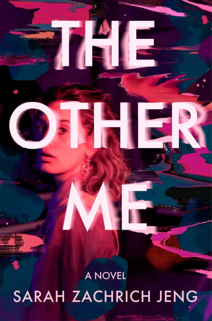 Book cover for The Other Me -- cover features pinks and purples and dark blues and a woman in a pink tone staring out at us. The background looks like blurry when a tv starts to malfunction.